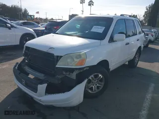 2003 Honda Pilot EX with VIN 2HKYF186X3H589128, listed as a IAAI auction lot 41546551 with 144,365 mi miles. Bid and sale history available at carsss.com. Image 17.