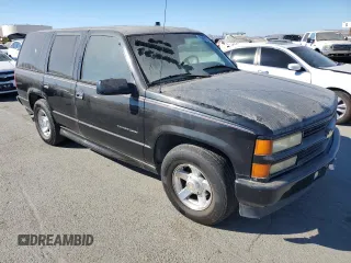2000 Chevrolet Tahoe Limited with VIN 1GNEC13R7YR221297, listed as a Copart auction lot 75504254 with 246,714 mi miles and Clean Title. Bid and sale history available at carsss.com. Image 4.