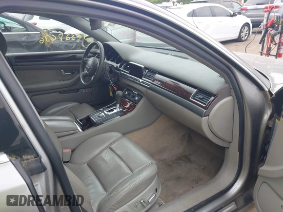 2005 Audi A8 with VIN WAUML44EX5N001847, listed as a IAAI auction lot 42328636 with 129,925 mi miles and . Bid and sale history available at DreamBid. Image 5.