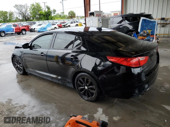 2014 Kia Optima EX z VIN 5XXGN4A79EG294524, wystawiony jako Copart lot #56227085 z przebiegiem 106 585 mil mil oraz Szkoda całkowita • Salvage title. Historia ofert i sprzedaży dostępna na DreamBid. Obrazek 2.