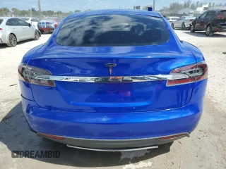 2014 Tesla Model S 60 with VIN 5YJSA1S14EFP44162, listed as a Copart auction lot 52943025 with Not Provided miles and Salvage Title. Bid and sale history available at DreamBid. Image 6.