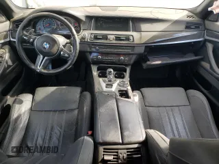 2014 BMW M5 z VIN WBSFV9C58ED593431, wystawiony jako Copart lot #54870555 z przebiegiem 172 191 mil mil oraz Szkoda całkowita • Salvage title. Historia ofert i sprzedaży dostępna na DreamBid. Obrazek 8.