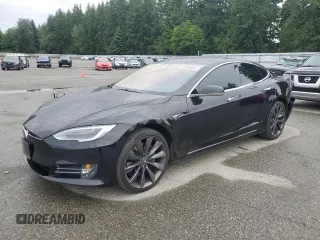 2017 Tesla Model S 100D with VIN 5YJSA1E21HF188840, listed as a Copart auction lot 62683685 with 90,101 mi miles and Salvage title. Bid and sale history available at DreamBid. Image 1.