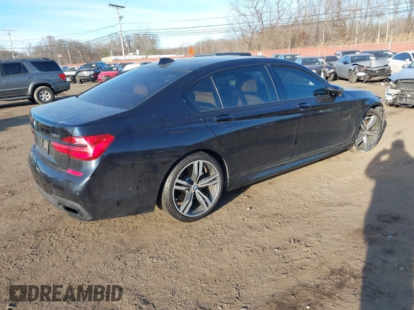 2017 BMW 7 Series 750i with VIN WBA7F0C34HGM21805, listed as a IAAI auction lot 41446797 with 88,753 mi miles and . Bid and sale history available at DreamBid. Image 4.
