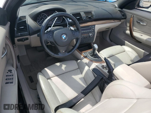2010 BMW 1 Series 135i with VIN WBAUN9C55AVK41973, listed as a Copart auction lot 54609015 with 144,685 mi miles and Salvage Title. Bid and sale history available at carsss.com. Image 8.