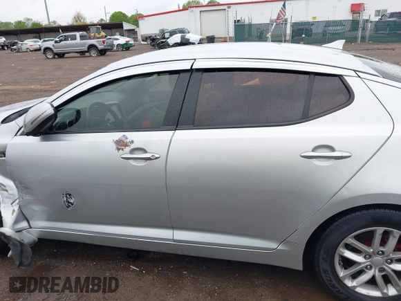 2013 Kia Optima LX z VIN KNAGM4A75D5431221, wystawiony jako IAAI lot #42244970 z przebiegiem 138 157 mil mil oraz . Historia ofert i sprzedaży dostępna na DreamBid. Obrazek 15.