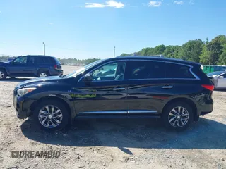 2015 Infiniti QX60 with VIN 5N1AL0MM4FC512551, listed as a IAAI auction lot 42336601 with 156,061 mi miles and . Bid and sale history available at DreamBid. Image 14.