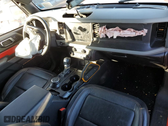 2021 Ford Bronco z VIN 1FMDE5CH3MLA60288, wystawiony jako Copart lot #79826644 z przebiegiem 12 451 mil mil oraz Szkoda całkowita • Salvage title. Historia ofert i sprzedaży dostępna na DreamBid. Obrazek 8.