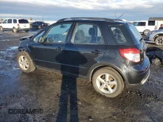 2009 Suzuki SX4 Man AWD with VIN JS2YB413896204560, listed as a Copart auction lot 84070084 with 128,015 mi miles and Salvage Title. Bid and sale history available at carsss.com. Image 2.