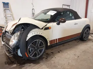 2013 MINI Roadster with VIN WMWSY1C52DT625564, listed as a IAAI auction lot 41442864 with 98,240 mi miles and . Bid and sale history available at DreamBid. Image 21.