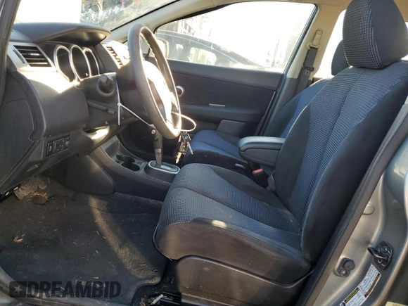 2010 Nissan Versa 1.8 SL with VIN 3N1BC1CPXAL431404, listed as a Copart auction lot 43817575 with 28,599 mi miles and Salvage Title. Bid and sale history available at carsss.com. Image 7.