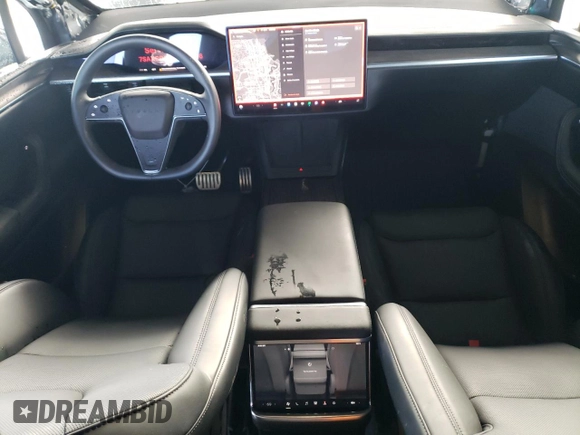 2023 Tesla Model X with VIN 7SAXCDE55PF410146, listed as a Copart auction lot 48818085 with 26,494 mi miles and Salvage Title. Bid and sale history available at DreamBid. Image 8.