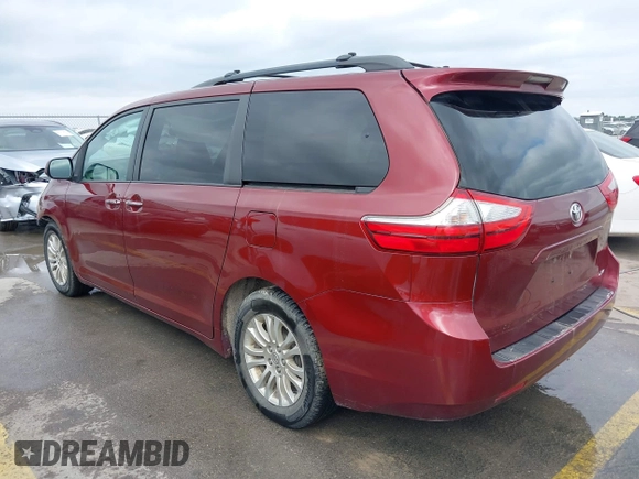 2015 Toyota Sienna XLE with VIN 5TDYK3DC0FS565597, listed as a IAAI auction lot 42062160 with 181,543 mi miles. Bid and sale history available at carsss.com. Image 3.