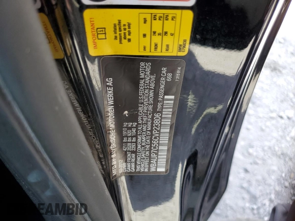 2012 BMW 1 Series 128i with VIN WBAUP7C56CVP23806, listed as a Copart auction lot 62339235 with 105,776 mi miles and Salvage title. Bid and sale history available at DreamBid. Image 12.