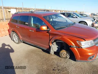 2014 Dodge Journey R/T z VIN 3C4PDDFG4ET104127, wystawiony jako IAAI lot #40702930 z przebiegiem 87 058 mil mil oraz . Historia ofert i sprzedaży dostępna na DreamBid. Obrazek 1.