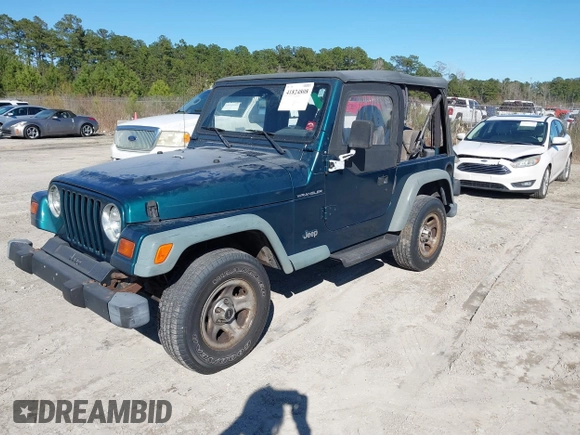 1997 Jeep Wrangler SE with VIN 1J4FY29P2VP492327, listed as a IAAI auction lot 41824808 with 156,646 mi miles. Bid and sale history available at carsss.com. Image 2.