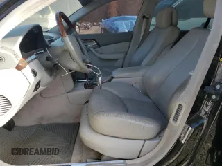 2003 Mercedes-Benz S-Class 5.0L with VIN WDBNG75J13A343070, listed as a Copart auction lot 77412604 with 154,533 mi miles and Salvage Title. Bid and sale history available at carsss.com. Image 7.