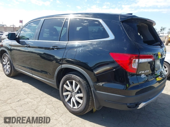 2020 Honda Pilot EX-L with VIN 5FNYF5H54LB009448, listed as a IAAI auction lot 41697106 with 63,310 mi miles. Bid and sale history available at carsss.com. Image 3.