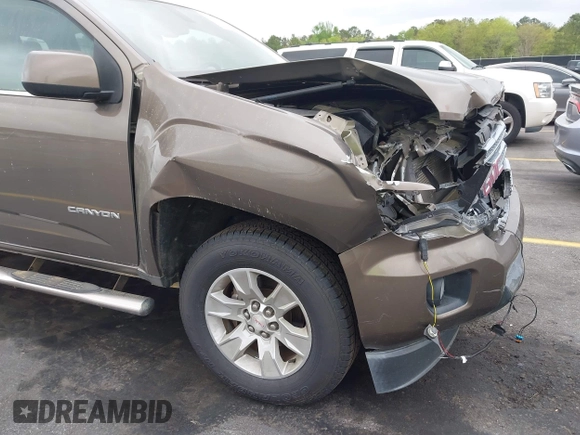 2015 GMC Canyon 2WD SLE with VIN 1GTG5BE38F1229799, listed as a IAAI auction lot 41944801 with 71,165 mi miles. Bid and sale history available at carsss.com. Image 17.