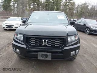 2014 Honda Ridgeline SE with VIN 5FPYK1F66EB005881, listed as a IAAI auction lot 41977349 with 184,567 mi miles. Bid and sale history available at carsss.com. Image 12.