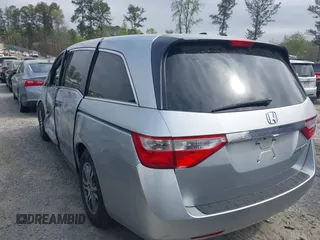 2012 Honda Odyssey EX-L with VIN 5FNRL5H66CB069916, listed as a IAAI auction lot 41935248 with 230,204 mi miles and . Bid and sale history available at carsss.com. Image 3.
