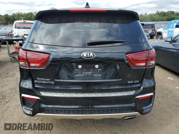 2020 Kia Sorento SX z VIN 5XYPKDA51LG703213, wystawiony jako Copart lot #70505674 z przebiegiem 48 270 mil mil oraz Szkoda całkowita • Salvage title. Historia ofert i sprzedaży dostępna na DreamBid. Obrazek 6.