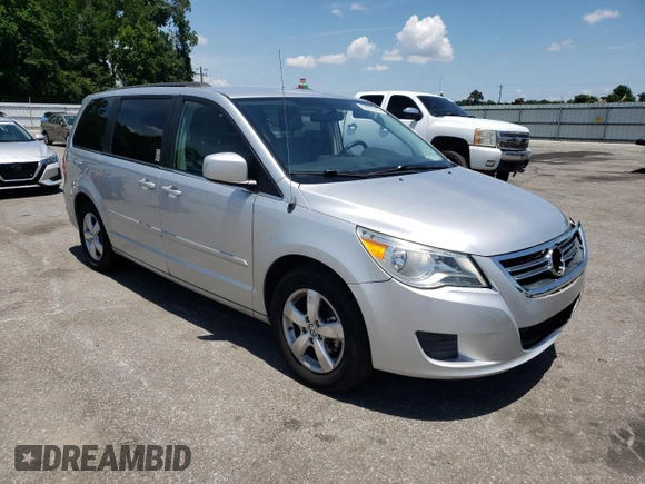 2011 Volkswagen Routan SE with VIN 2V4RW3DG2BR766535, listed as a Copart auction lot 62953345 with 172,620 mi miles and Salvage title. Bid and sale history available at DreamBid. Image 4.