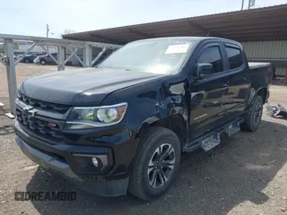2021 Chevrolet Colorado 4WD Z71 z VIN 1GCGTDEN1M1256939, wystawiony jako IAAI lot #42071364 z przebiegiem 38 972 mil mil oraz . Historia ofert i sprzedaży dostępna na DreamBid. Obrazek 2.