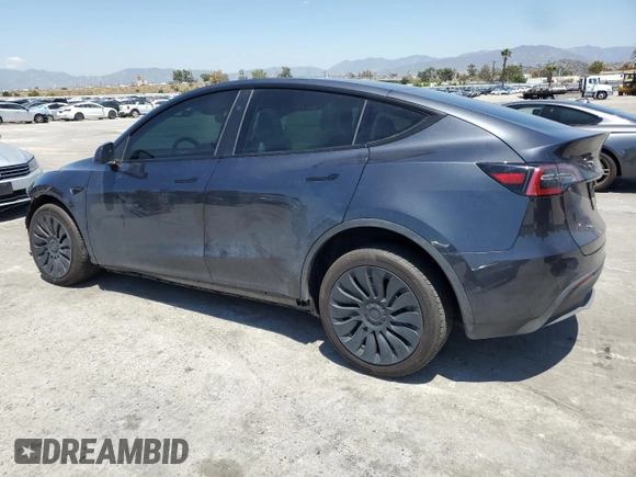 2024 Tesla Model Y Long Range with VIN 7SAYGDEE6RA226035, listed as a Copart auction lot 52539375 with 14,220 mi miles and Salvage title. Bid and sale history available at DreamBid. Image 2.