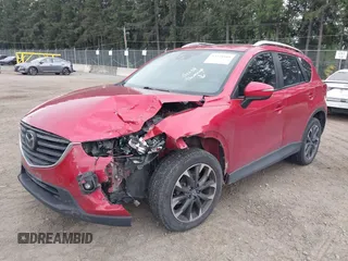 2016 Mazda CX-5 Grand Touring z VIN JM3KE4DY7G0687318, wystawiony jako IAAI lot #42228585 z przebiegiem 188 793 mil mil oraz . Historia ofert i sprzedaży dostępna na DreamBid. Obrazek 17.