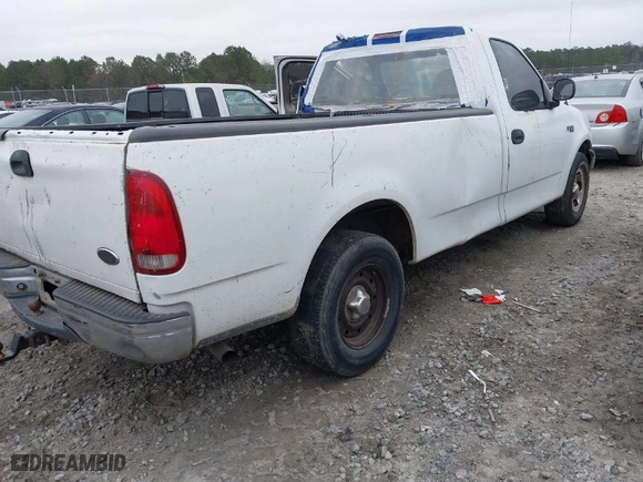2004 Ford F-150 Heritage XL with VIN 2FTRF17264CA39757, listed as a IAAI auction lot 41490855 with NaN miles. Bid and sale history available at carsss.com. Image 4.