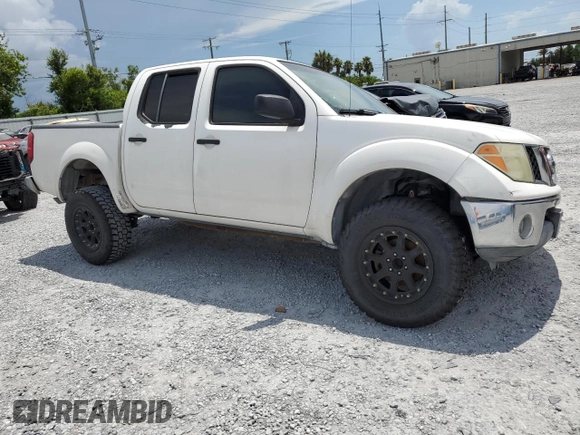 2005 Nissan Frontier LE with VIN 1N6AD07U65C417532, listed as a Copart auction lot 61588315 with 197,514 mi miles and Salvage title. Bid and sale history available at DreamBid. Image 4.