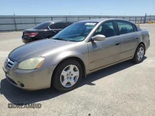 2004 Nissan Altima S with VIN 1N4AL11D44C171475, listed as a Copart auction lot 57795185 with 136,549 mi miles and Salvage title. Bid and sale history available at DreamBid. Image 1.