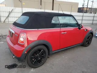 2015 MINI Convertible with VIN WMWZN3C59FT862963, listed as a Copart auction lot 86016514 with 96,493 mi miles and Salvage title. Bid and sale history available at DreamBid. Image 3.