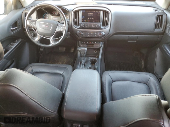 2021 GMC Canyon 4WD AT4 w/Cloth with VIN 1GTG6FEN5M1100096, listed as a Copart auction lot 77535584 with 25,152 mi miles and Salvage Title. Bid and sale history available at carsss.com. Image 8.