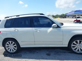 2012 Mercedes-Benz GLK GLK 350 with VIN WDCGG5GB8CF735979, listed as a IAAI auction lot 41931333 with 124,649 mi miles. Bid and sale history available at carsss.com. Image 13.