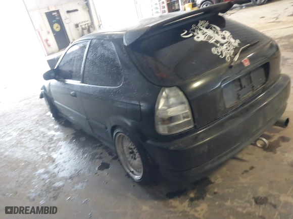 1999 Honda Civic DX with VIN 2HGEJ6448XH111972, listed as a IAAI auction lot 41556969 with 261,095 mi miles. Bid and sale history available at carsss.com. Image 3.