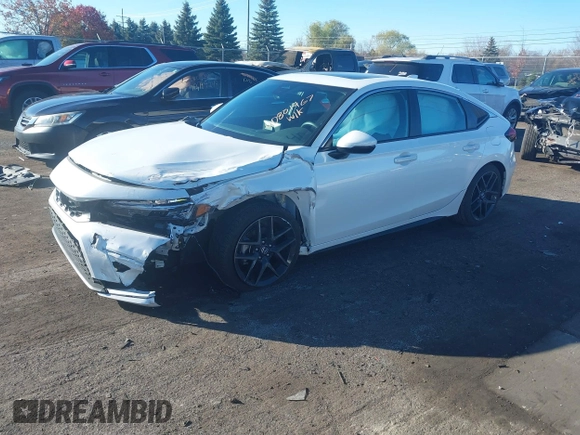 2024 Honda Civic Sport Touring z VIN 19XFL1G88RE019662, wystawiony jako IAAI lot #40801467 z przebiegiem 6 922 mil mil oraz . Historia ofert i sprzedaży dostępna na DreamBid. Obrazek 2.