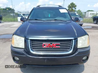2003 GMC Envoy SLT with VIN 1GKES16S536169306, listed as a IAAI auction lot 42234834 with 239,144 mi miles and . Bid and sale history available at DreamBid. Image 6.