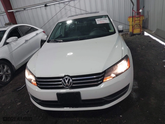 2013 Volkswagen Passat SE w/Sunroof with VIN 1VWBH7A35DC111003, listed as a IAAI auction lot 41991990 with 142,103 mi miles. Bid and sale history available at carsss.com. Image 12.