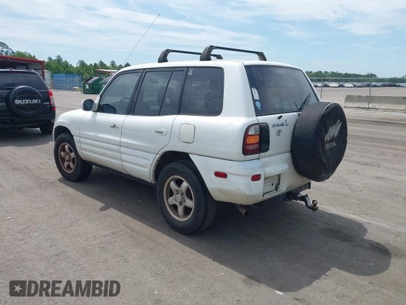 1999 Toyota RAV4 with VIN JT3GP10V8X7054552, listed as a IAAI auction lot 42361645 with 266,630 mi miles and . Bid and sale history available at DreamBid. Image 3.