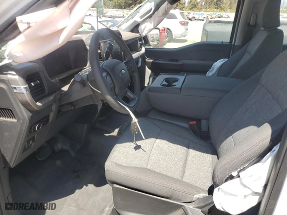 2024 Ford F-150 XL with VIN 1FTFW1L50RKD66323, listed as a Copart auction lot 62536704 with 511 mi miles and Salvage Title. Bid and sale history available at carsss.com. Image 7.