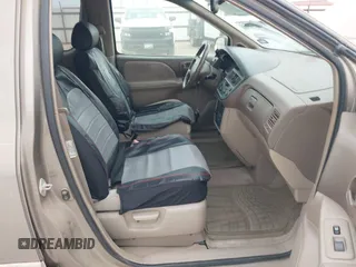 1999 Toyota Sienna LE with VIN 4T3ZF13C5XU164075, listed as a IAAI auction lot 42063741 with 93,407 mi miles. Bid and sale history available at carsss.com. Image 5.