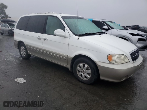 2005 Kia Sedona LX with VIN KNDUP132356753784, listed as a Copart auction lot 85112374 with 169,123 mi miles and Salvage Title. Bid and sale history available at carsss.com. Image 4.
