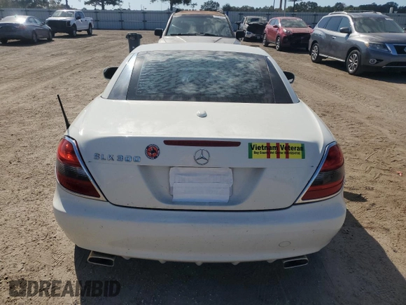 2009 Mercedes-Benz SLK-Class 3.0L with VIN WDBWK54F79F209339, listed as a Copart auction lot 77400294 with 68,540 mi miles and Salvage Title. Bid and sale history available at carsss.com. Image 6.