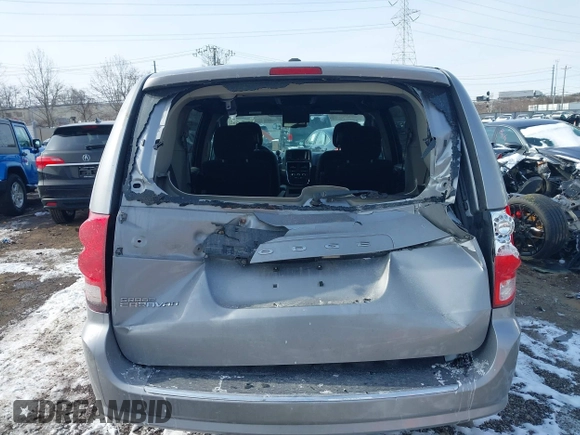 2015 Dodge Grand Caravan SE with VIN 2C4RDGBG3FR653239, listed as a IAAI auction lot 41607222 with 124,732 mi miles and . Bid and sale history available at DreamBid. Image 16.