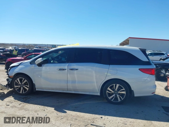 2023 Honda Odyssey Touring with VIN 5FNRL6H88PB003865, listed as a IAAI auction lot 41715384 with 40,765 mi miles and . Bid and sale history available at DreamBid. Image 14.