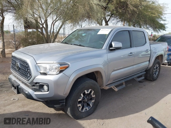 2020 Toyota Tacoma SR5 with VIN 3TMCZ5AN1LM324828, listed as a IAAI auction lot 40977362 with 33,906 mi miles and . Bid and sale history available at DreamBid. Image 6.