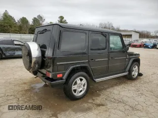 2002 Mercedes-Benz G-Class with VIN WDCYR49E12X133160, listed as a Copart auction lot 47310015 with 93,526 mi miles and Salvage Title. Bid and sale history available at carsss.com. Image 3.