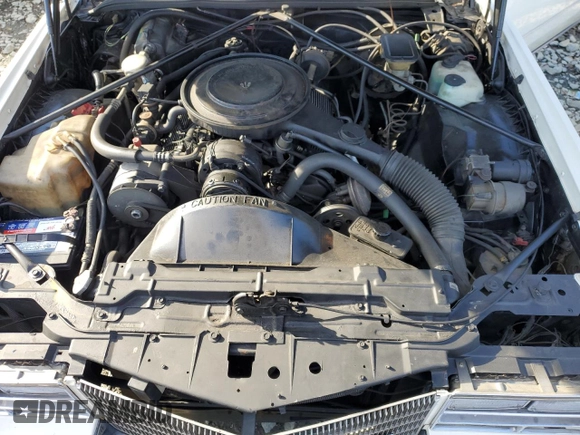 1985 Cadillac Eldorado z VIN 1G6EL5787FE663828, wystawiony jako Copart lot #47460755 z przebiegiem 91 853 mil mil oraz Tytuł czysty. Historia ofert i sprzedaży dostępna na DreamBid. Obrazek 11.